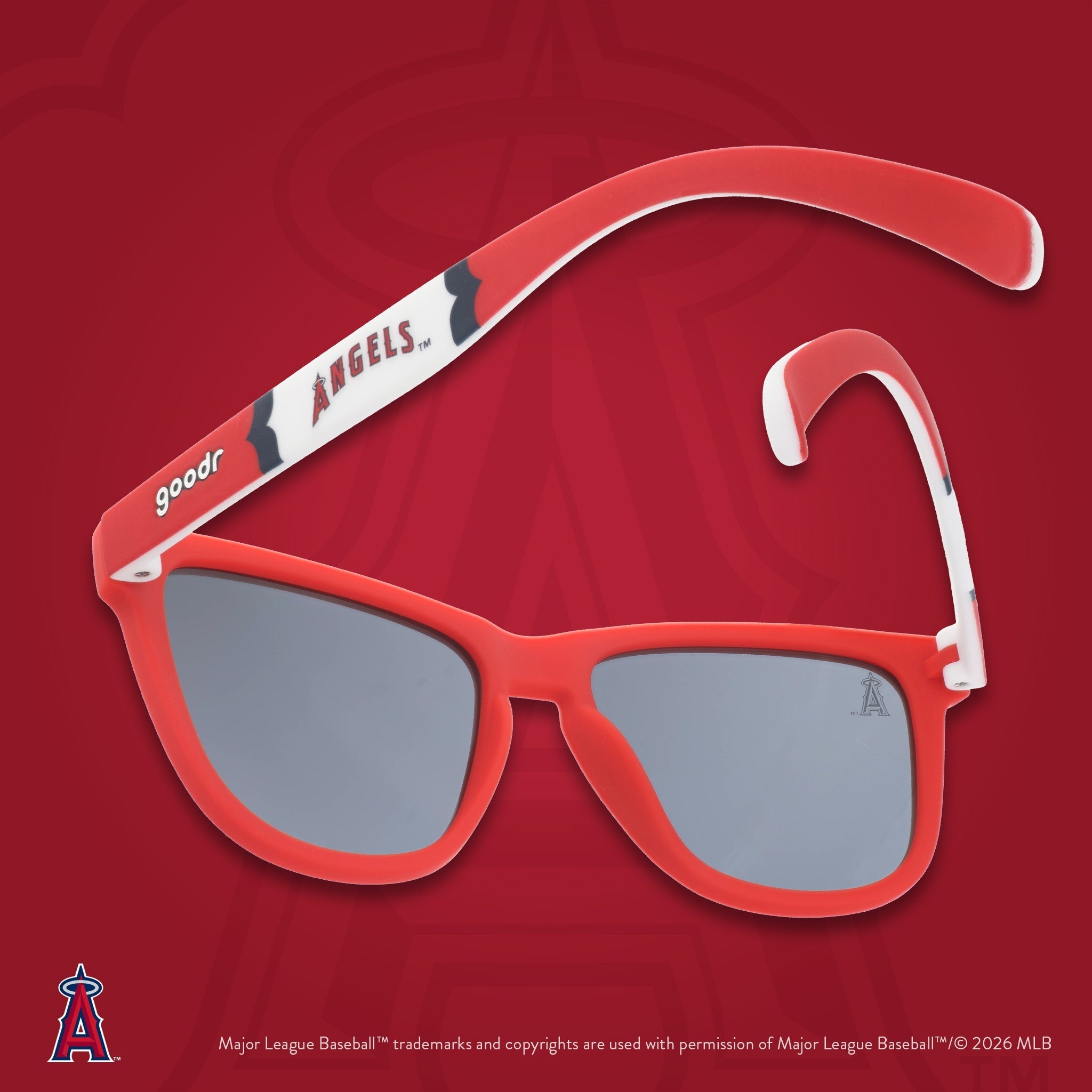 Red, white, and blue shades photographed from behind, floating against a red background featuring the team's "halo A" logo.
