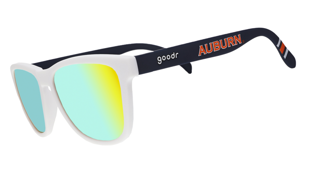 goodr sunglasses with blue, yellow & green lenses, white frames, and navy blue arms with the word "Auburn" written across in orange