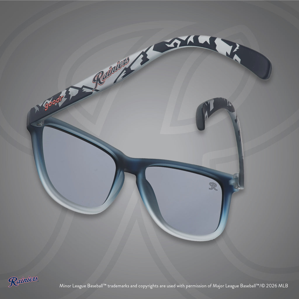 Back view of sunglasses. Gray frames w/ mountain pattern, Rainiers on temples + black non-reflective lenses.