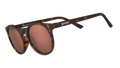 Three-quarter angle view of round brown tortoiseshell sunglasses with non-reflective brown circle-shaped lenses.