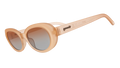 Three-quarter angle view of translucent pale peach oval Beat G sunglasses with orange-gold gradient lenses.