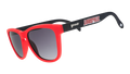 Three-quarter angle view of black and Cardinal red sunglasses featuring black gradient lenses and a Louisville logo.
