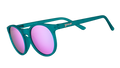 Three-quarter angle view of round teal sunglasses with reflective purple circle-shaped lenses.
