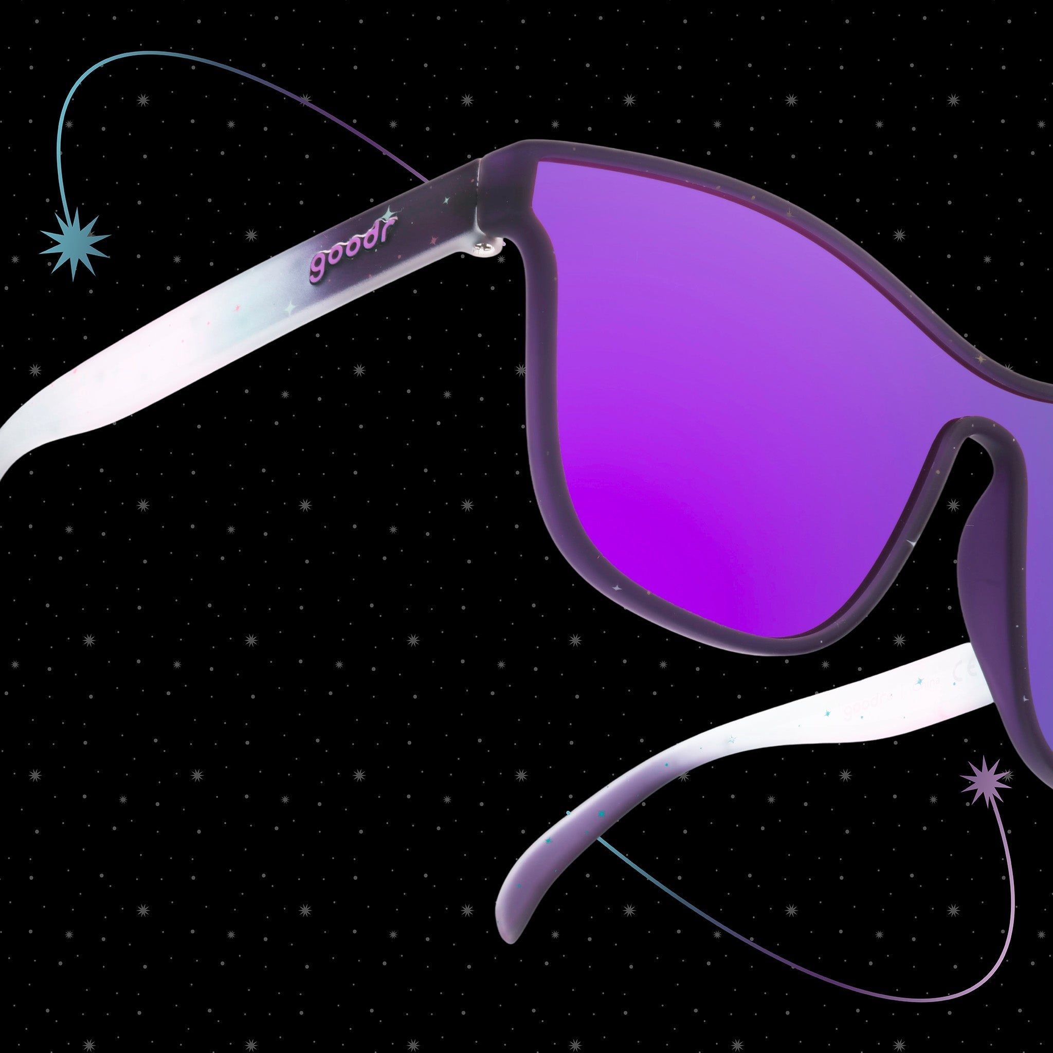 Close-up three-quarter view of purple-blue ombre VRGs featuring a cosmos design and a reflective pink-purple lens.