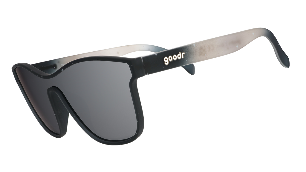 Three-quarter view of translucent black and gray ombre VRG frames featuring a cosmos design and chrome reflective lens.