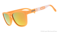 Three-quarter angle view of tan sunglasses w/ white Crayola marker pattern + amber reflective lenses tilted down.