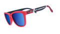 Three-quarter angle view of MLS St. Louis CITY SC shades tilted down. Red+black frames. Blue reflective lenses.