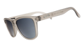 A pair of grey, square shaped sunglasses on a white background.