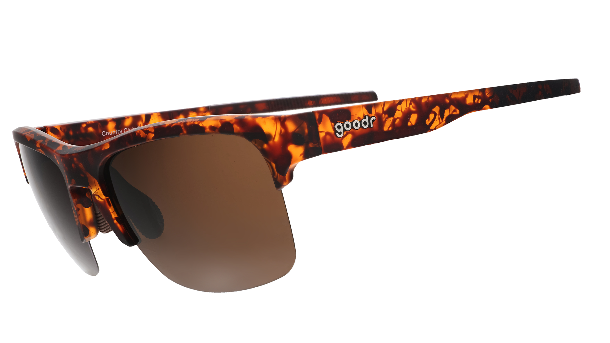 Three-quarter angle view of half-rim brown tortoiseshell sunglasses with brown non-reflective lenses and brown silicone grips on the inner arms.