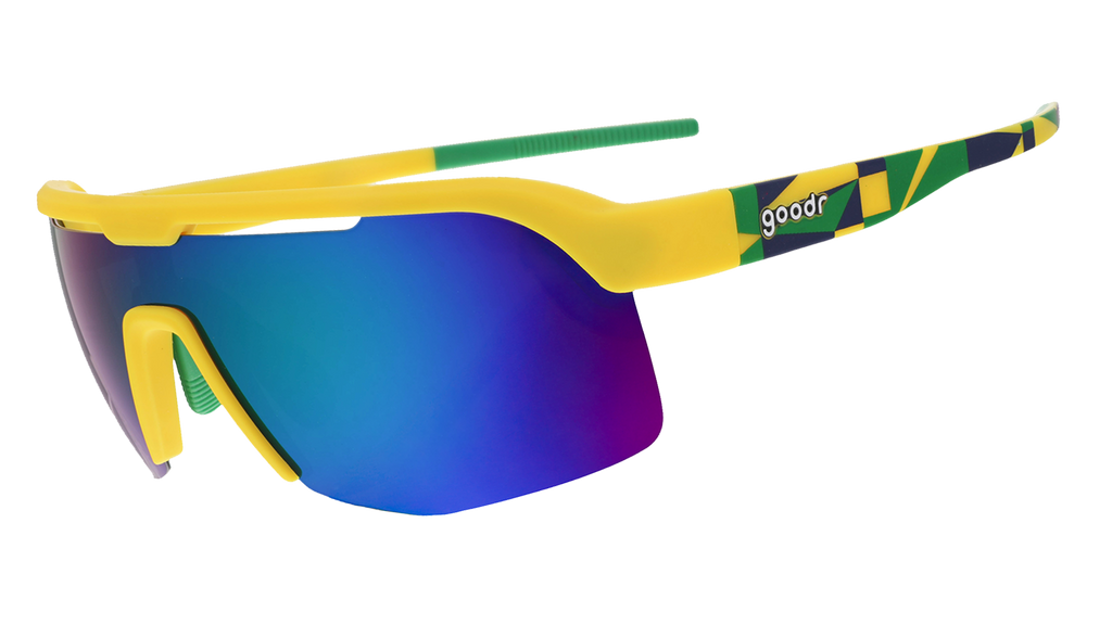 Side view of yellow shield sunglasses with light green mirrored lenses and patterned temple arms.