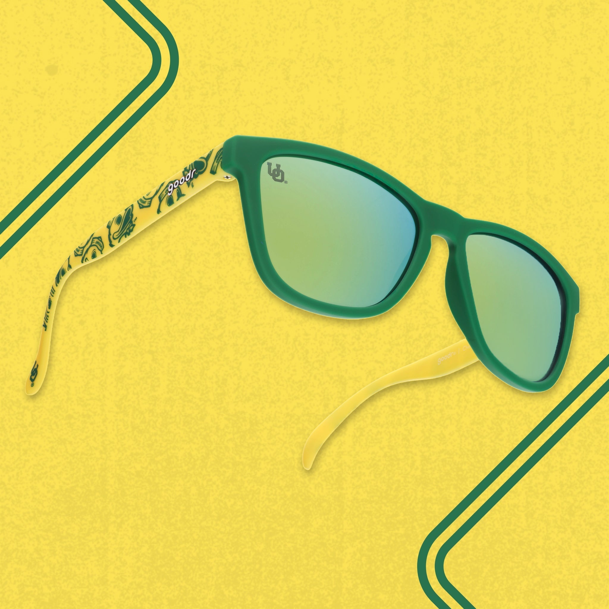 Three quarter angle of yellow-and-green shades featuring the Oregon Ducks duck mascot against a yellow background.