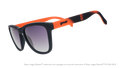Three-quarter angle view of a pair of black and orange Giants sunglasses featuring the SF logo on the arm.