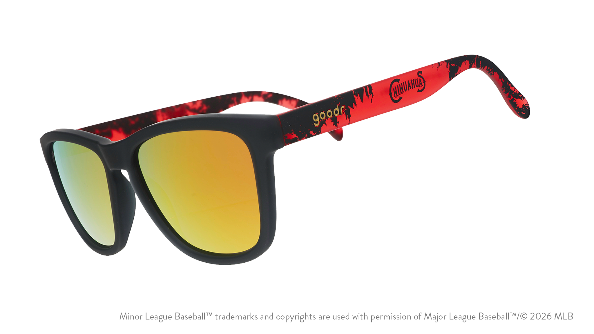 Angled view of shades tilted down. Dark gray+red frames w/ Chihuahuas on temples. Amber reflective lenses.