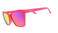 Three-quarter angle view of hot pink angled cat-eye sunglasses with pink reflective lenses.