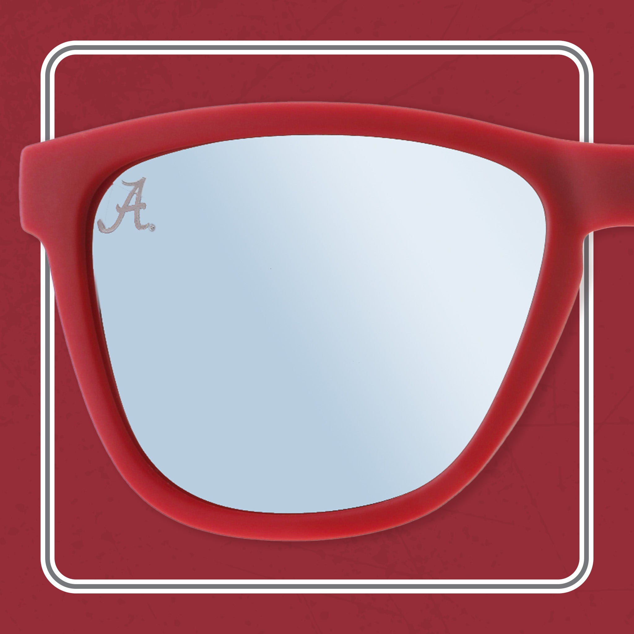 A close-up of red sunglasses with reflective lenses. The left lens features a subtle "A" logo in the top corner, and the background is a matching red with a white border.