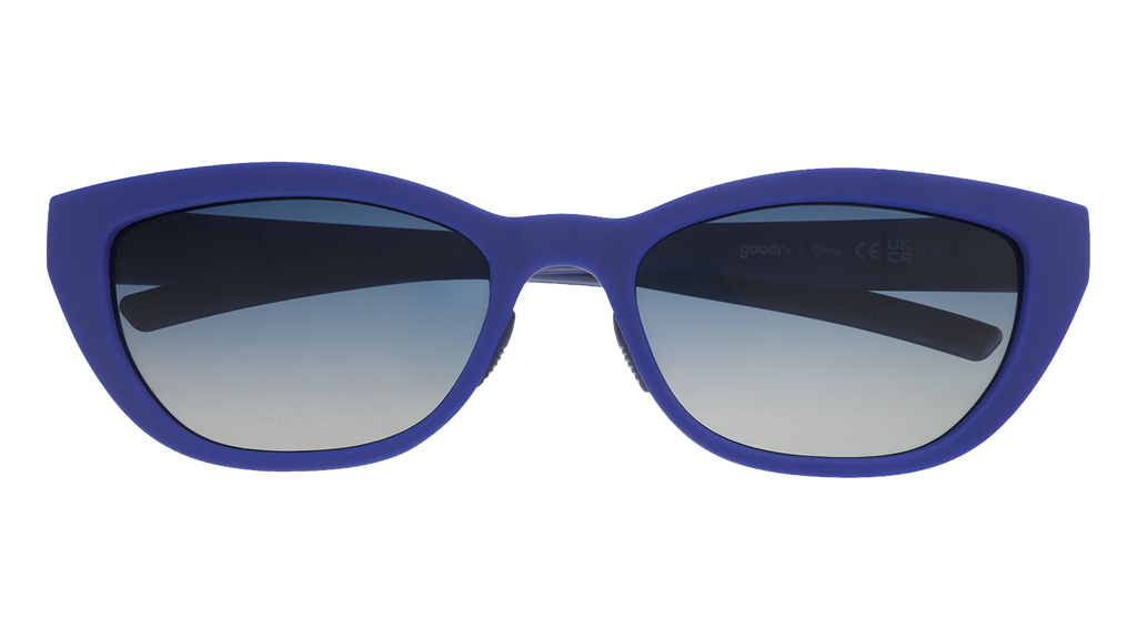 Front view of cat eye sunglasses. Navy blue front frame with blue gradient lenses on a white background.