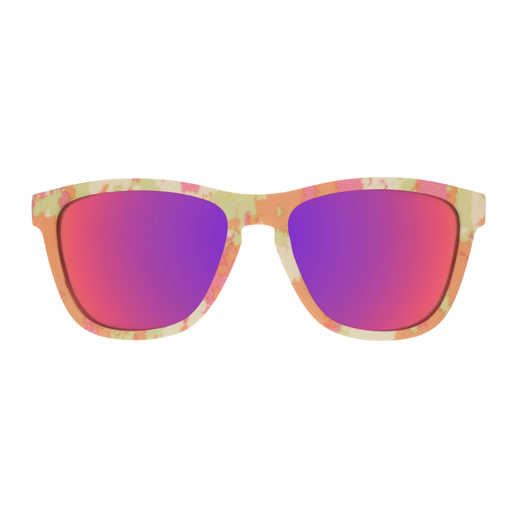 Front view of yellow, pink, and orange tie-dye shades with rose reflective lenses.