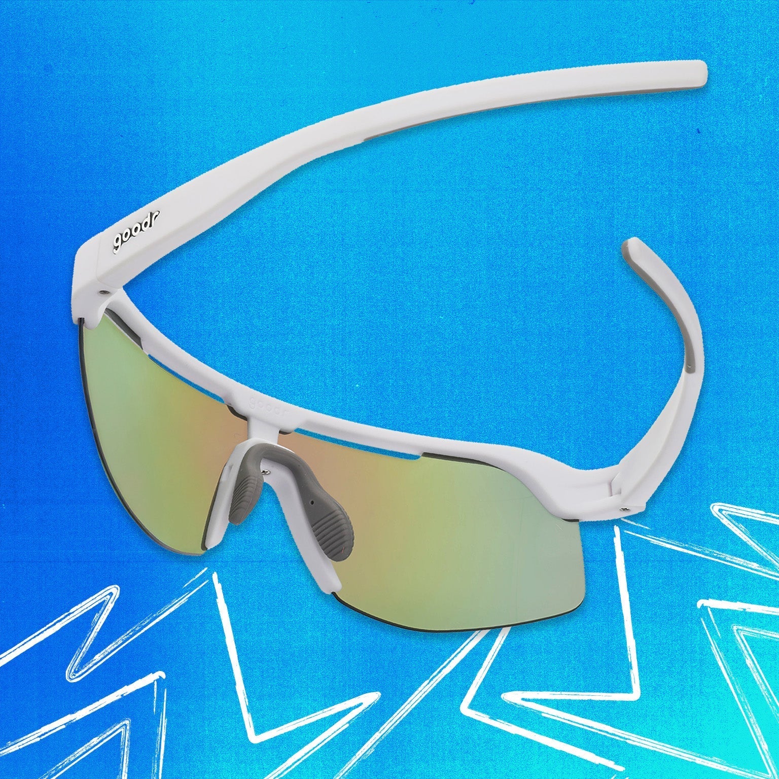 Back view of white shield sunglasses with green reflective wrap lenses tilted down on a blue background.