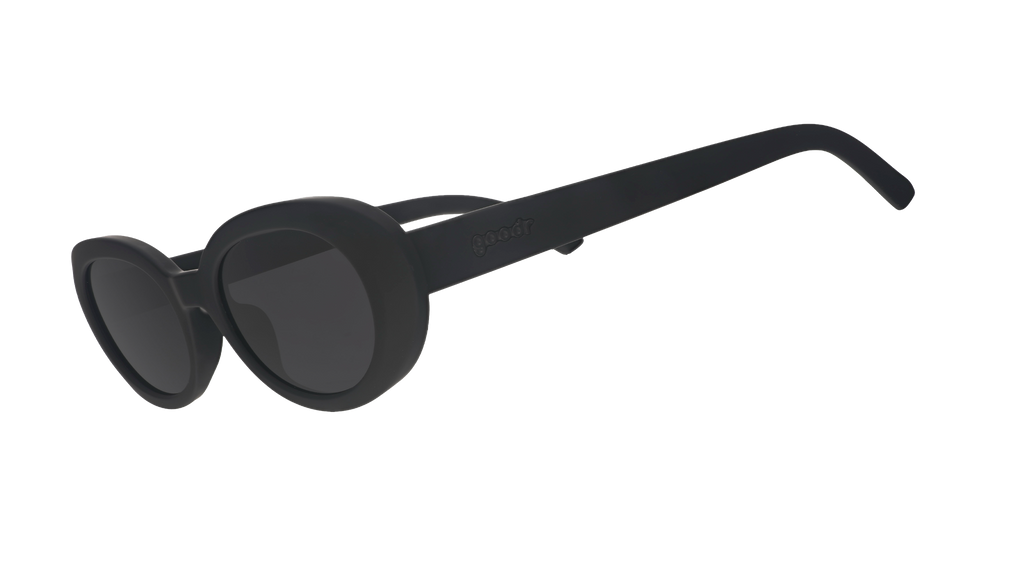 Three-quarter angle view of black oval sunglasses with polarized lenses against a white background.